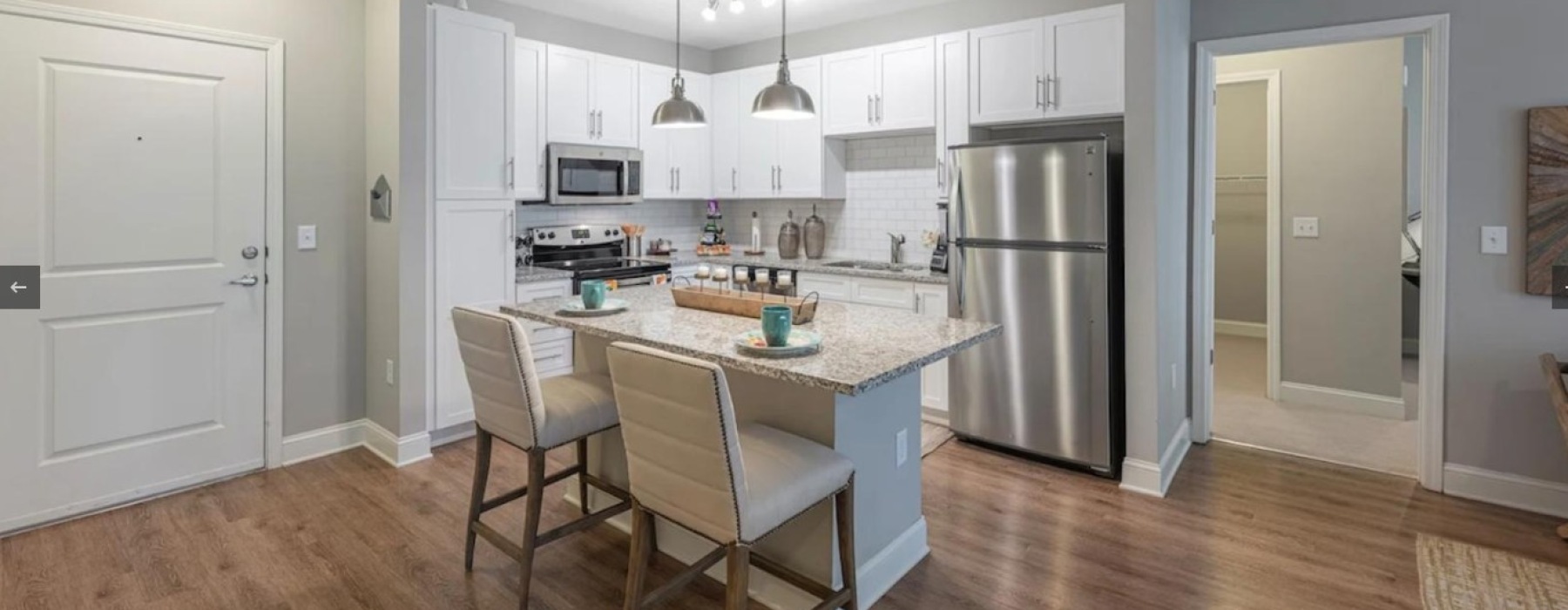 kitchen with bright lighting and ample counter space